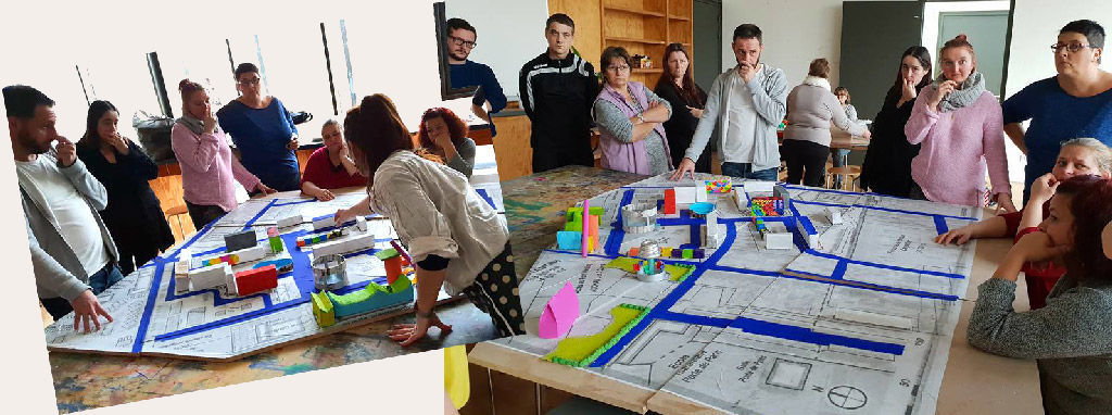 Groupe travaillant sur la maquette du quartier du Fort Nieylay à Calais - Atelier participatif de Karine Bracq