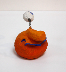 Castagnettes de l'espace modèle placide orange vue de profile - Boutique de Karine Bracq